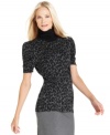 Add some animal-print panache to your next outfit with this turtleneck sweater from Style&co.