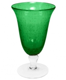 The eye-catching Iris iced tea glass makes a big impact in any setting with a bright emerald tint and tiny bubbles trapped in dishwasher-safe glass. From Artland.