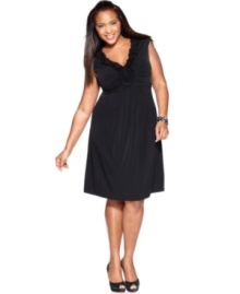 A ruffled neckline lends feminine elegance to Charter Club's sleeveless plus size dress, defined by a flattering A-line shape-- look dazzling from desk to dinner!