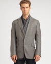 Expect the unexpected with this classically-inspired three-button blazer shaped in the supreme softness of a wool and cashmere blend, featuring a zip-out front vest panel and an additional front ticket pocket.Button-frontNotch lapelChest welt, waist flap pocketsSide vents86% wool/14% polyesterDry cleanMade in Italy