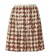 Lady-chic allure gets a cool modern update in Burberry Brits modern houndstooth printed silk skirt - Hidden back zip, allover print, full flared skirt - Pair with soft knit tops and pumps