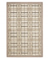 A traditional basketweave plaid is updated for the modern home in this area rug only from Martha Stewart rugs. Hand tufted in India of long wool fibers, this luxurious home accent presents unparalleled comfort and style underfoot.