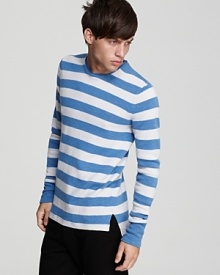 Oozing old world charm, this wide-stripe sweater takes the classic look up a notch with solid elbow patches, a double-layered crew neck and vented drop tail hem.