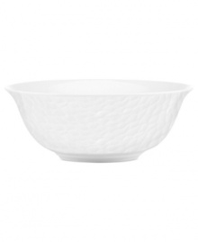 Set the tone with the white bone china of Devore dinnerware. A matte, organic texture lends chic distinction to a serving bowl that's equally suited for fine dinner parties and every day of the week. From Donna Karan by Lenox.