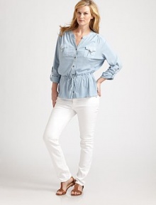 A simple button-down shirt offering you exquisite arm coverage, a comfortable, drawstring waist and a relaxed, undeniably flattering fit.Split collarRoll-tab sleevesFront pocketsButton frontDrawstring waistBack yokeAbout 26 from shoulder to hemCottonMachine washImported