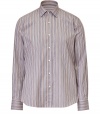 Neutral-hued stripes cover this stylish button down from Etro, adding sleek appeal to your workweek look - Spread collar, front button placket, curved hem, slim fit, all-over stripe print - Wear with jeans, chinos, or trousers