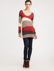 Overwhelmingly soft sweater tunic with dropped shoulders and a graphically charged colorblock pattern. ScoopneckDropped shouldersLong sleevesAbout 33 from shoulder to hem40% acrylic/33% nylon/20% mohair/7% woolDry cleanImportedModel shown is 5'10 (177cm) wearing US size Small.