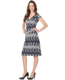 Evan Picone gives this matte jersey dress a dash of nautical inspiration with a navy and white print. A faux drawstring detail at the waist adds to the charm!