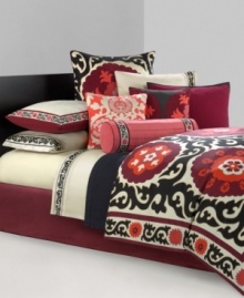 A mixture of applique and embroidery details sits on a bright orange ground in this Samarkand decorative pillow from N Natori. Zipper closure.