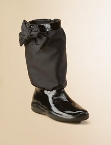 Tech fabric with crinkled patent leather finished with a bow on the side.Rubber sole Side zipper Imported