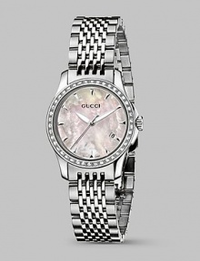 From the G-Timeless Collection. A prestigious design with classic, round face and diamond-patterned dial is encrusted with 42 luminescent diamonds and in the durability and lasting elegance of stainless steel.