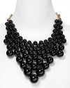 kate spade new york's beaded bib necklace takes an outfit from tired to trendy with the clip of a gold-tone clasp.