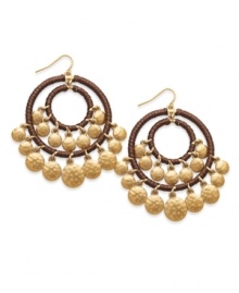 Bohemian beauty. Recalling the free-spirited style of the 1960s, Lauren by Ralph Lauren's gypsy hoop earrings are embellished with hammered disks and cording. Crafted in gold tone mixed metal. Approximate drop: 1-1/2 inches.