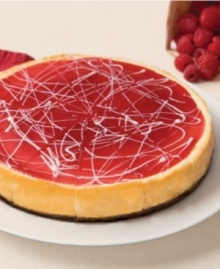 Romantic, thoughtful, delish! Creamy white chocolate cheesecake is topped with a red raspberry glaze, drizzled with white chocolate and baked on a decadent chocolate cookie crust. Perfect for sharing with guests or savoring by yourself!