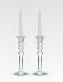 Finely crafted candlesticks in pure lead crystal with subtle texture and splendid clarity. From the Mille Nuits Collection Set of 2 Fits standard taper candle Candle not included 7½ high Hand wash Made in France