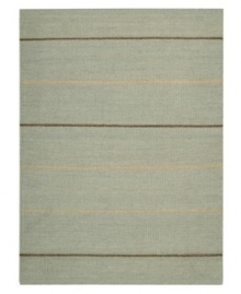 Subtle striping gives way to understated sophistication in the Horizon area rug from Calvin Klein. Generously thick wool fibers are hand tufted in India for remarkable strength and detailed design. Perfect for mixing with any style decor. (Clearance)