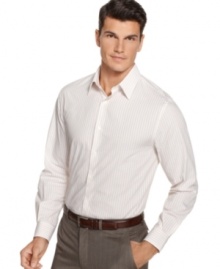 A simple solution with a subtle, vertical dobby stripe, this Perry Ellis shirt brings a modern edge to your wardrobe must-haves.