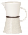 A universal favorite, the Lucia pitcher combines a modern shape and classic style. Earthy stoneware with a crackle effect and lustrous metallic glaze brings easy sophistication to casual settings. By Niels Refsgaad for Dansk.