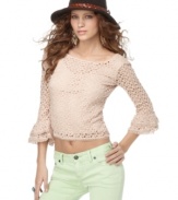 Sweet yet a little bit sexy, contrast this sheer crochet lace Free People top over everyday denim for a hot spring look!