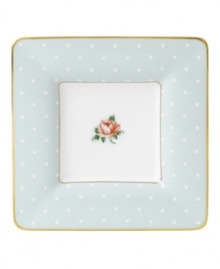 Royal Albert updates a classic with the playfully patterned Polka Rose square trinket plate. Dainty dots mix with Old Country Roses on gold-banded bone china.