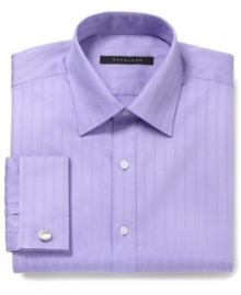 Subtle stripes still make a serious statement on this handsome Sean John dress shirt.