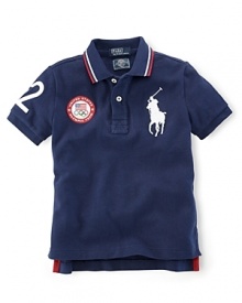 This preppy short-sleeve polo shirt in breathable cotton mesh celebrates Team USA's participation in the 2012 Olympics with the official U.S. Olympic Team logo and the Big Pony at front and London embroidery at the back.