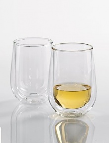 A unique design in mouthblown, double-wall crystal provides clever insulation so your wine maintains its temperature long after its been poured. The suspended visual effect also makes for a compelling presentation. Set of 4 6-ounce capacity 4¼H X 2½ diam. Dishwasher safe Imported 