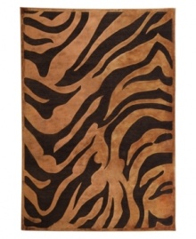 A dramatic zebra print indulges your flair for the exotic, enlivening your space with a chic, contemporary allure. Designed for easy care and long-lasting wear, this striking area rug from Surya will maintain its plush texture even in high-traffic areas.