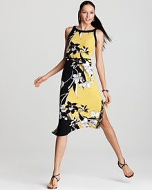 Striking florals bloom against the slinky silhouette of this T Tahari midi dress for a modern take on femininity. Team with leather sandals for 24-7 chic.