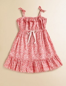 A pretty woven vine print with ruffles at the neck and hem is your little girl's ultimate warm-weather frock.Tie shoulder strapsElasticized neckline with double rufflesSlightly high, elasticized waist with tieFull skirt with wide ruffled hemPullover stylingCottonMachine washImported