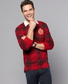 In a sporty plaid, this long-sleeved polo shirt from Tommy Hilfiger adds a preppy note to your sportswear.