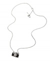 Fashion in a flash. Fossil's glitzy camera pendant features black leather and clear crystal accents. Setting and chain crafted in silver tone mixed metal. Approximate length: 26 inches + 2-inch extender. Approximate drop: 3/4 inch.