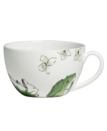 Vera Wang's Floral Leaf watercolor adds fresh artistry to this chic bone china teacup from her collection of Wedgwood dinnerware. The dishes have a smooth, minimalist shape in clean white which blooms with crisp greens for a modern look and feel that's ideal for every day.