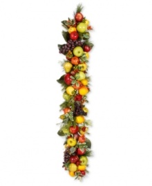 Invigorate your space this holiday season with the vibrant look of this colorful Mixed Fruit holiday garland. It features a myriad of fruits clustered with pine branches, showcasing one festive harvest.