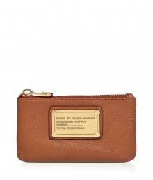 Add luxe style to the everyday with this leather key pouch from Marc by Marc Jacobs - Rectangular shape with round edges, top zip closure, front logo with gold-tone hardware, internal key ring detail, textured leather - Perfect for daily use or as a thoughtful gift