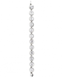 Scintillating style. You'll sparkle plenty in this fabulous flex bracelet from Monet. Crafted in silver tone mixed metal and embellished with glittering Swarovski crystals, it's sure to become a glamorous go-to look in your jewelry collection. Approximate length: 7-1/2 inches.