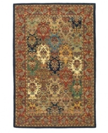 An eye-catching display of color and texture that finds its heritage in the rug-making techniques of ancient Persia. Tufted in India from pure wool, this Safavieh area rug is set in striking primaries with an all-over floral motif that adorns your floor with a visually stunning presence. (Clearance)