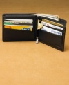 Classic style. Fossil's Evans Zip Passcase Wallet features card slots, slip pockets, and a bill compartment to keep you organized. Made from soft genuine leather, it has a silver-tone logo plaque on the front.