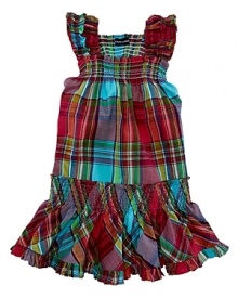 A sweet madras sundress is accented with smocking and ruffles for a playful look.