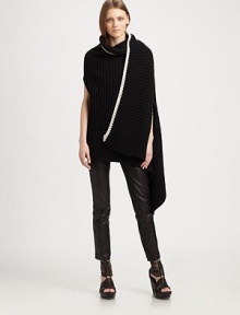 Rib-knit merino wool, in a sculptural, utterly versatile wrap style.Contrast edgingAllover rib-knitSleevelessAbout 67 X 43Merino woolDry cleanImportedModel shown is 5'9½ (176cm) wearing US size 4. 