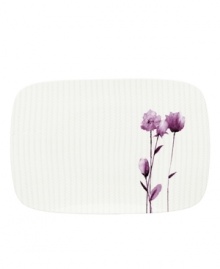 Blur the line between garden style and modern design with the Watercolors Amethyst rectangular platter. Purple blossoms flourish against a playful dot pattern while the white coupe shape couples the sleek look and unparalleled durability of bone china. Qualifies for Rebate