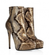 Finish your look on a luxurious note with Le Sillas ultra glamorous python ankle boots, detailed in chic natural coloring perfect for pairing with statement daytime separates - Softly pointed toe, hidden platform, inside zip, dagger heel, leather and rubber sole - Wear with sleek leggings and chunky knit tops, or with form-fitting sheaths and a dusting of sparkly jewelry