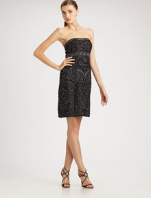 A sophisticated strapless dress with intricate beading and embroidery.Strapless neckline Allover beading and embroidery Empire waist Center rear vent About 21 from natural waist Back zip closure Fully lined Polyester; spot clean Imported Additional Information Women's Premier Designer & Contemporary Size Guide 