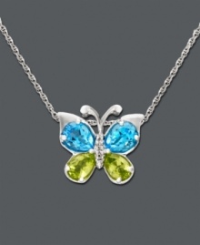 Pretty colorful wings will set your heart aflutter. Embrace nature with this delicate butterfly pendant featuring oval-cut blue topaz (1-5/8 ct. t.w.) and pear-cut peridot (7/8 ct. t.w.) wings and a diamond-accented body. Crafted in sterling silver. Approximate length: 18 inches. Approximate drop: 1/2 inch.