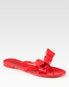 A dimensional bow upgrades this casual staple in ultra-smooth PVC. PVC upperPVC lining and soleMade in Italy