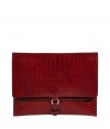 Streamlined and sophisticated in rich red embossed calf leather, Jil Sanders envelope clutch is an elegant way to incorporate color into your outfit - Buckled strap, front pocket, black lining - Carry as a pared down finish to modern-minimalist looks