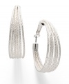 Simple hoops with star quality. Alfani's silver tone mixed metal hoops features a unique multi-row design with a textured finish. Approximate diameter: 1-1/2 inches.