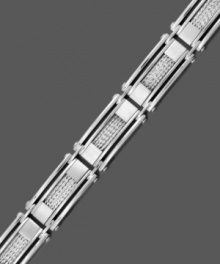 Industrial chic. Finely sculptured style adds the perfect accent to your look. Men's bracelet comes in stainless steel with a sterling silver mesh inlay. Approximate length: 8-1/2 inches.