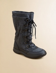 An essential boot is constructed with a fleece-lined wool upper and a durable rubber sole to keep the wind and water away.Lace-upWool upper with leather trimFleece liningRubber solePadded insoleImported