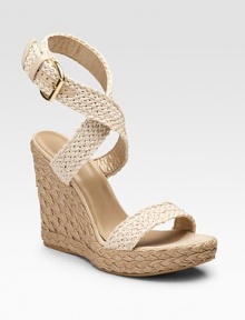 A crocheted ankle-strap design with leather details and roped, rural-inspired wedge.Roped wedge heel, 4¾ (120mm) Roped platform, 1¼ (30mm) Compares to a 3½ heel (90mm) Open toe Adjustable strap with buckle Cotton upper Leather lining Padded insole Rubber sole Made in SpainOUR FIT MODEL RECOMMENDS ordering true size.. 